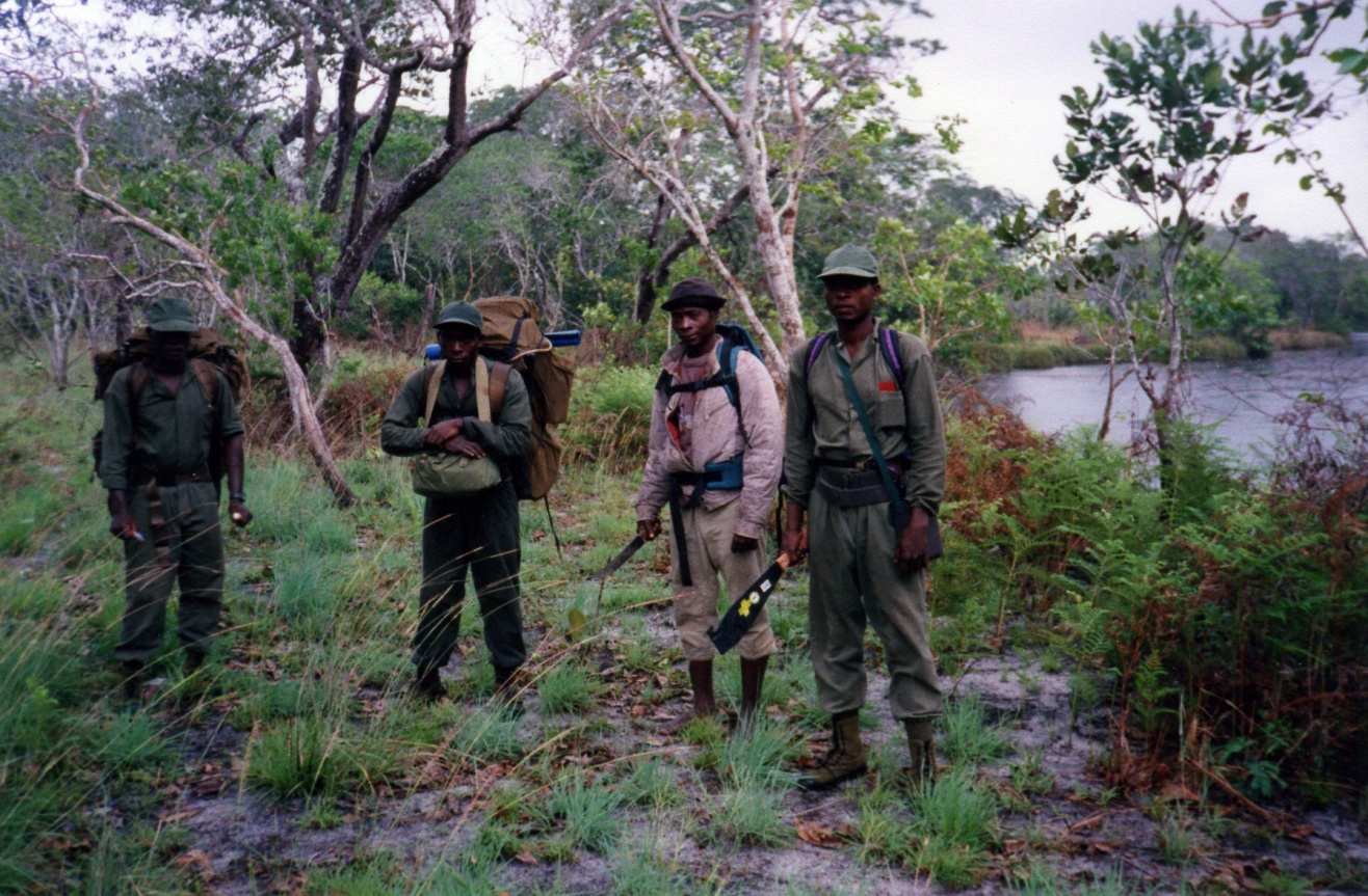 The backpacks the men are carrying are loaded with supplies and a few other necessities for survival in the bush.